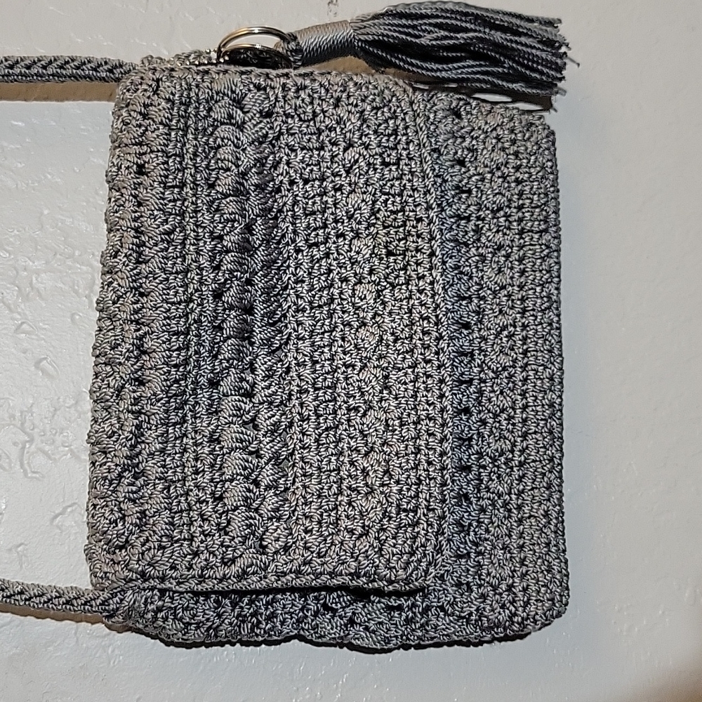 The Sak crochet crossbody in heathered gray with tassel